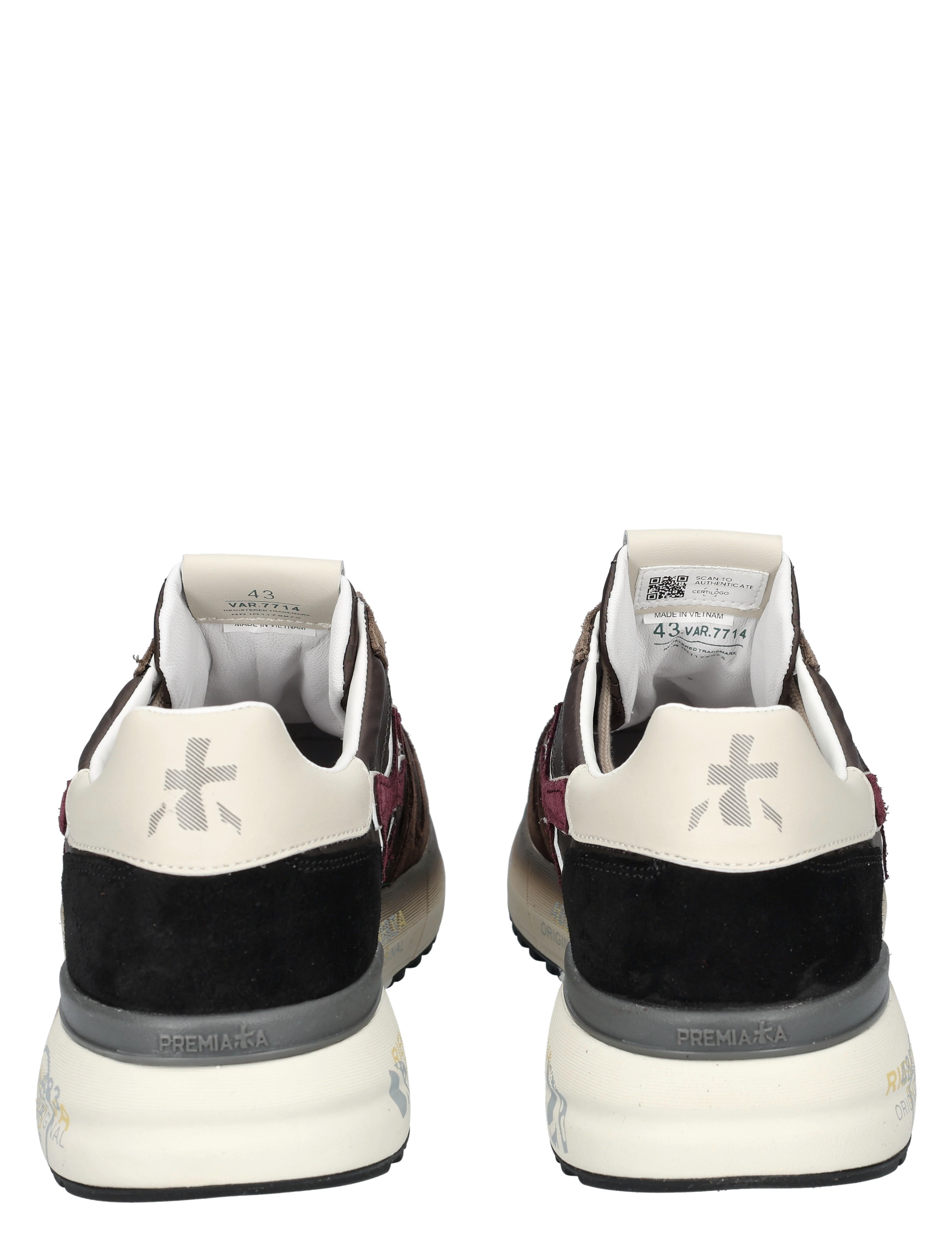 zwarte hiel, witte teenstuk, lila accenten, sneaker, hielstuk label Premiata