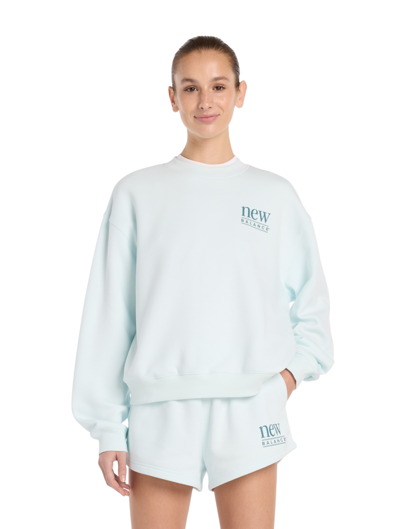 New Balance - Reimagined Fleece Crew Women Glint Blue - Dames - Truien en Sweaters - 49628_33_1